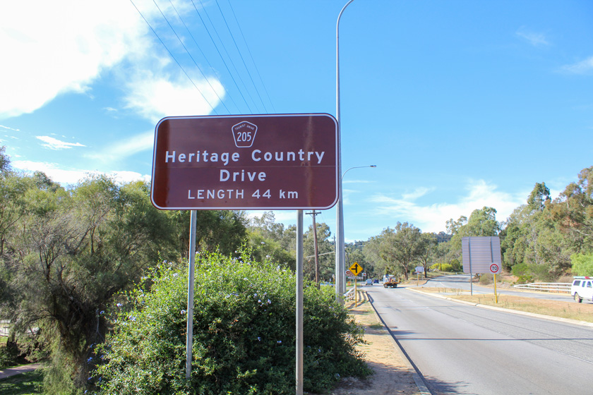 Brown tourist attraction road signs in Armadale WA